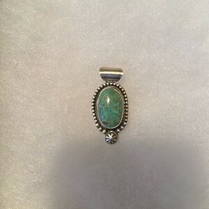Sterling silver and Kingman Turquoise Navajo pendant. Handmade.